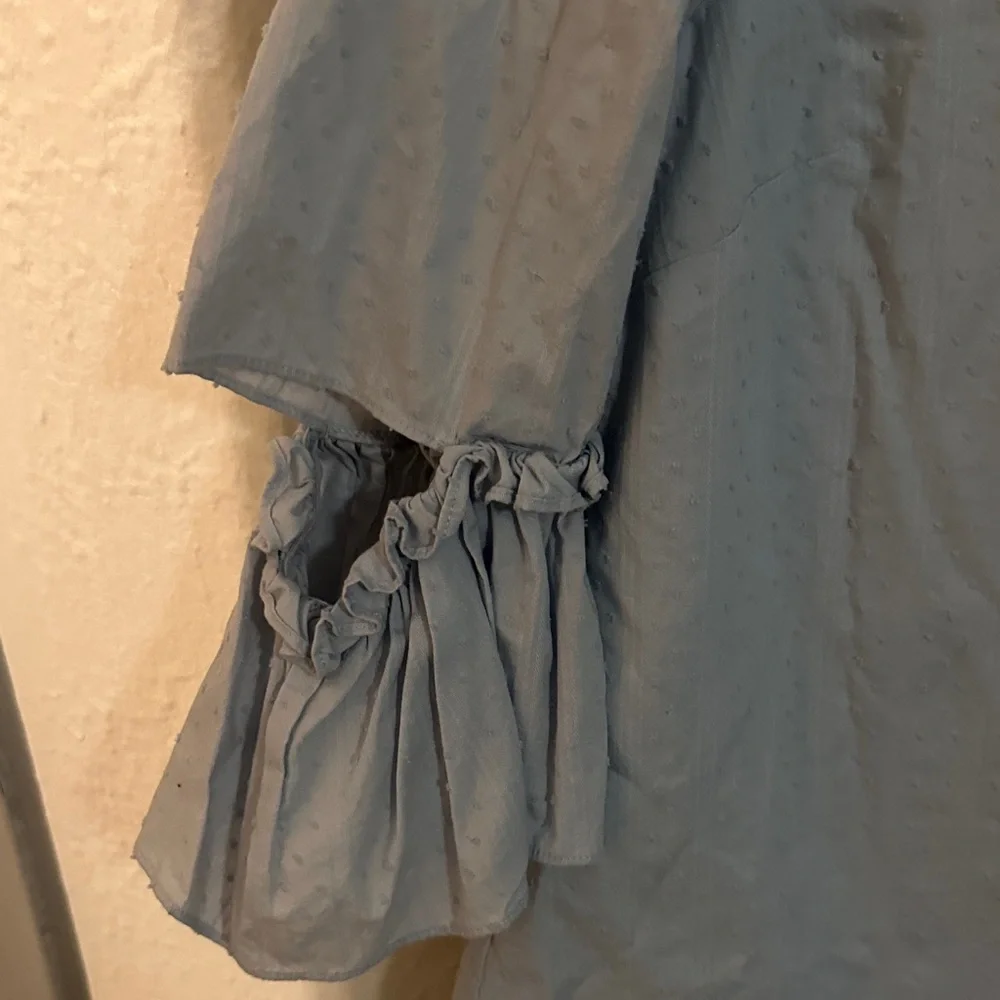 CeCe Light Blue Ruffle-Sleeve Textured Blouse - Picture 4 of 6